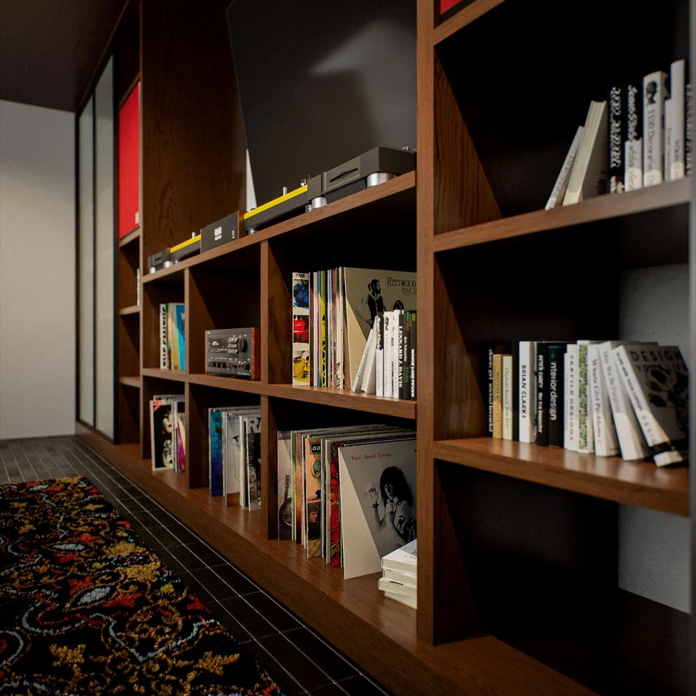 Close view of records, books and audio equipment in dark shelving