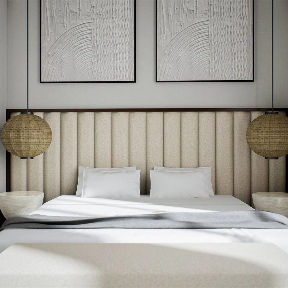 Bed with a padded headboard and woven pendant lamps